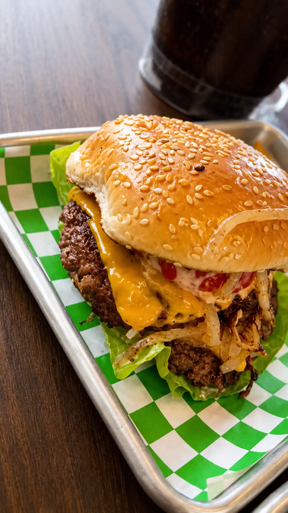 Burger on checkered tray